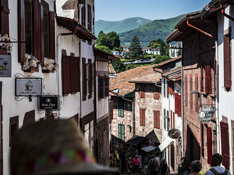 Alley with people and houses in Saint-Jean-Pied-de-Port